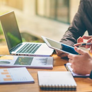 Business people are analyzing and planning business. Business Strategy Consulting